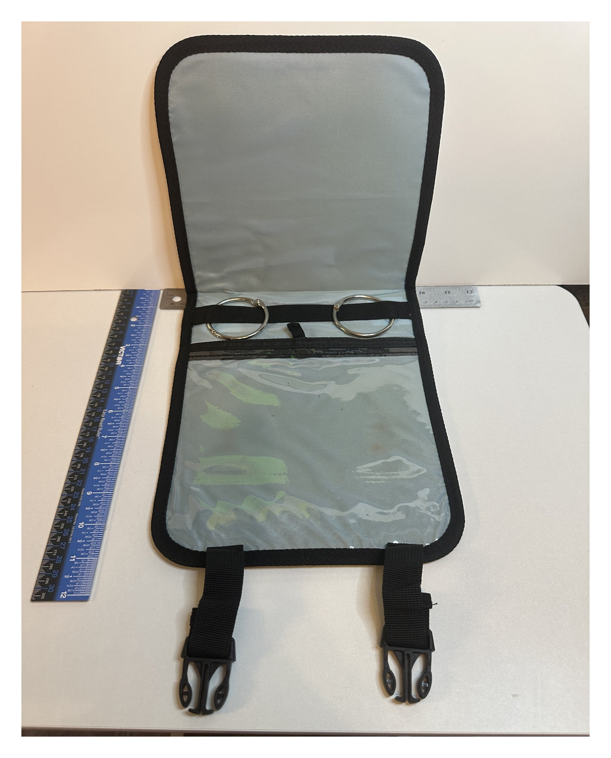 Z-Man Bait BinderZ fully open, flat lay - clear sleeves, rings and buckle straps