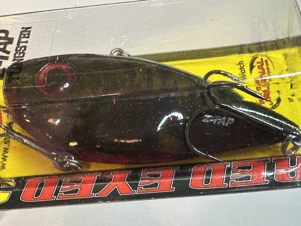 Close-up detail - Phantom Watermelon Red Craw bait in package