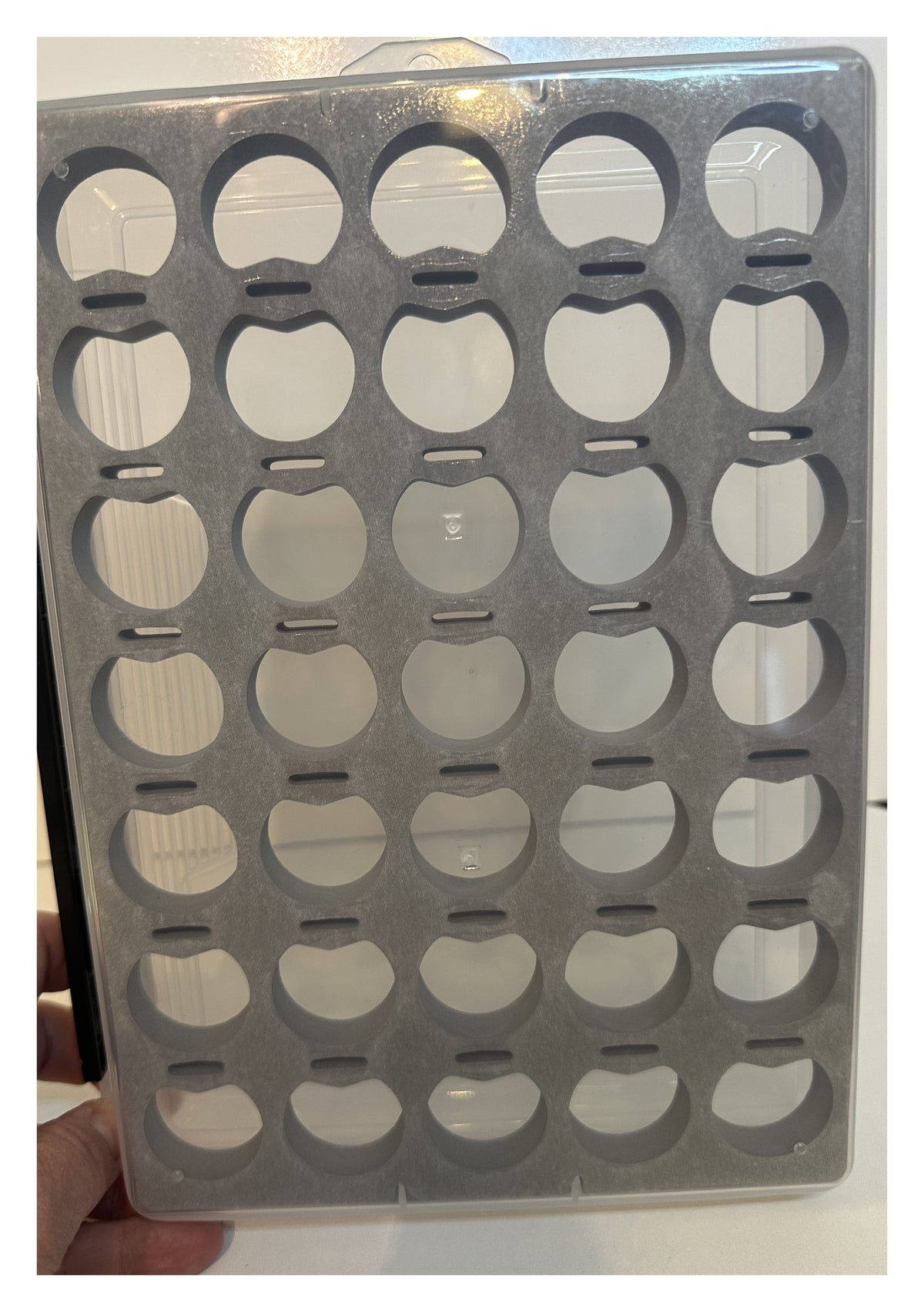 Foam insert tray with 35 spool holes - top-down close view